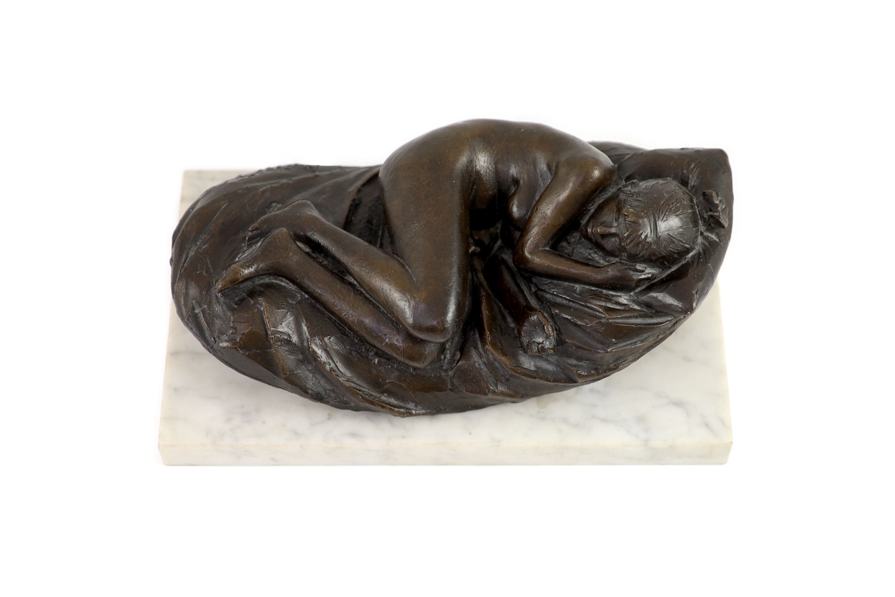 James W. Butler. RA., A bronze model of a sleeping girl, width 31cm depth 18cm height 13cm